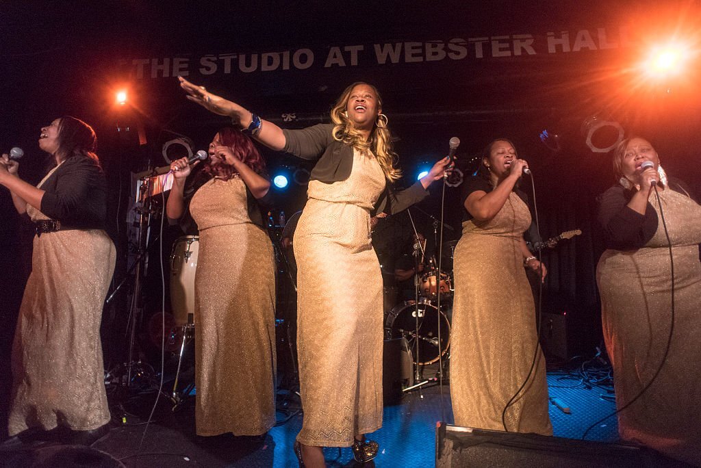 American musician Alexis Jones (center), on lead vocals, performs with the Jones Family Singers at the 12th Annual GlobalFest on the Studio Stage at Webster Hall, New York, New York.